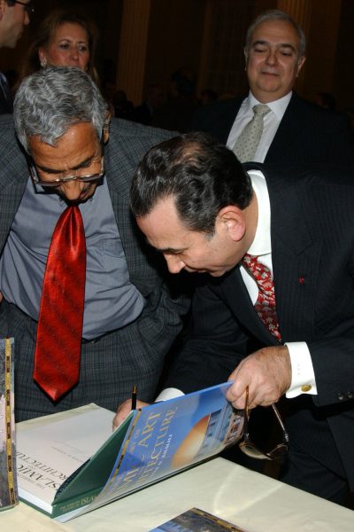 Signing the book - Timeline History of Islamic art and Architecture