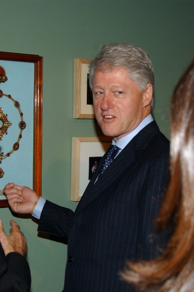 President Bill Clinton during a private view of the exhibition, Heaven on Earth at the Hermitage Rooms, Somerset House, London, 12th July 2004.