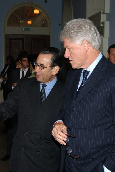 President Bill Clinton during a private view of the exhibition, Heaven on Earth at the Hermitage Rooms, Somerset House, London, 12th July 2004.