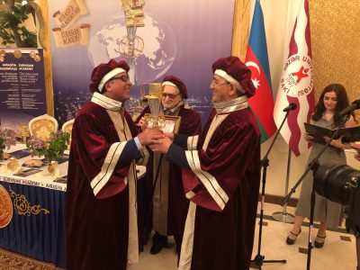 Sir David received the Eurasian Legend Award from Professor Hamlet Isakhanli, Founding Member of the Eurasian Academy